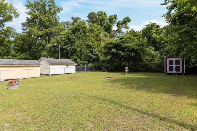 view of yard with a shed and an outdoor structure