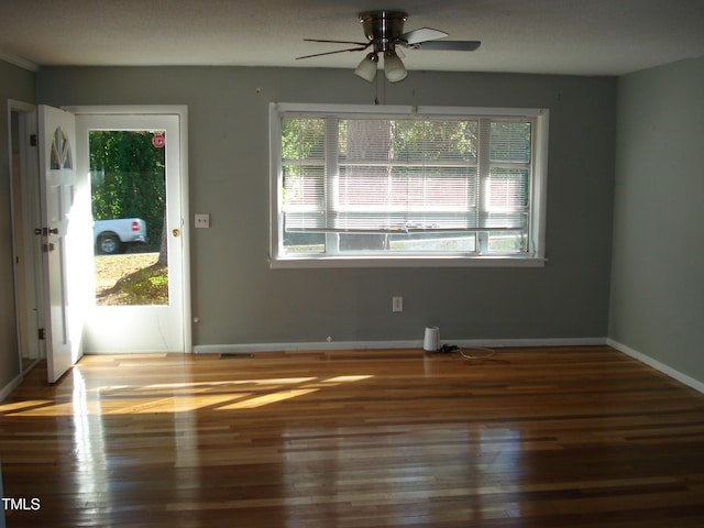 6383 Elevation Rd, Benson, NC 27504 - foyer featuring a ceiling fan, wood finished floors, and baseboards