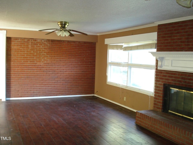 6383 Elevation Rd, Benson, NC 27504 - unfurnished living room featuring ornamental molding, baseboards, ceiling fan, a brick fireplace, and a textured ceiling