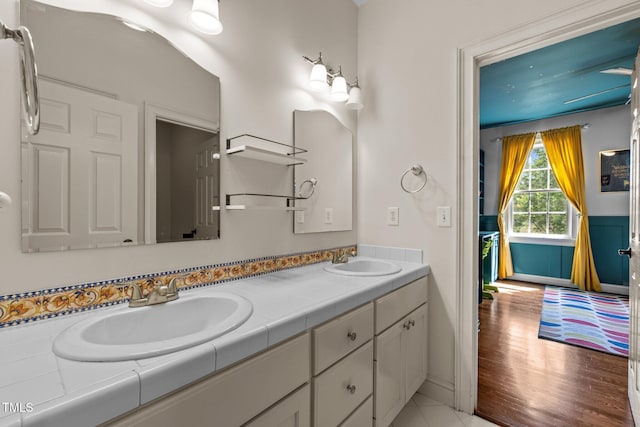 100 Michaels Way, Chapel Hill, NC 27516 - bathroom with double vanity, baseboards, and wood finished floors