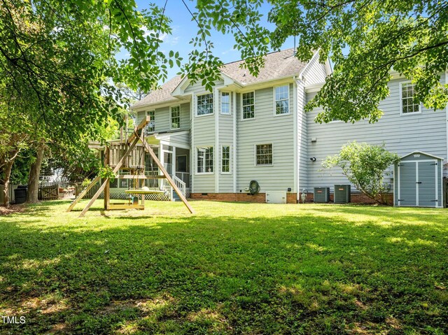 100 Michaels Way, Chapel Hill, NC 27516 - rear view of property with crawl space, a storage unit, a sunroom, an outdoor structure, and roof with shingles