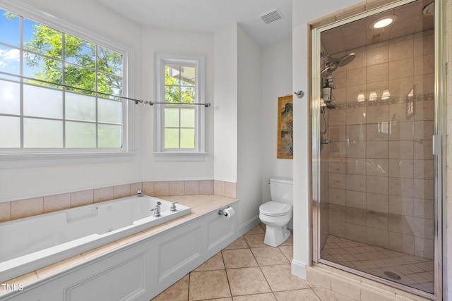 100 Michaels Way, Chapel Hill, NC 27516 - bathroom featuring toilet, tile patterned flooring, a shower stall, and a garden tub