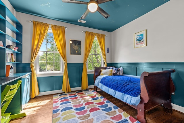 100 Michaels Way, Chapel Hill, NC 27516 - bedroom with wood finished floors, a wainscoted wall, and ceiling fan