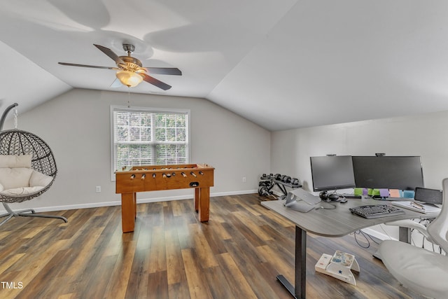 office area featuring a ceiling fan, vaulted ceiling, wood finished floors, and baseboards