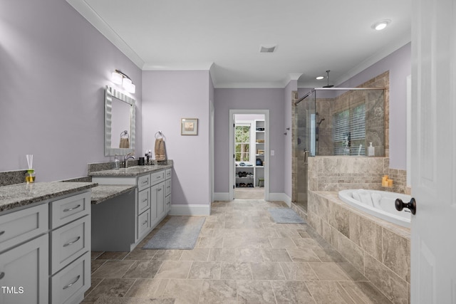 4306 Infinity Ln, Durham, NC 27705 - full bath with a shower stall, vanity, crown molding, a garden tub, and baseboards