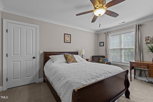 4306 Infinity Ln, Durham, NC 27705 - bedroom featuring light carpet, baseboards, ornamental molding, and ceiling fan