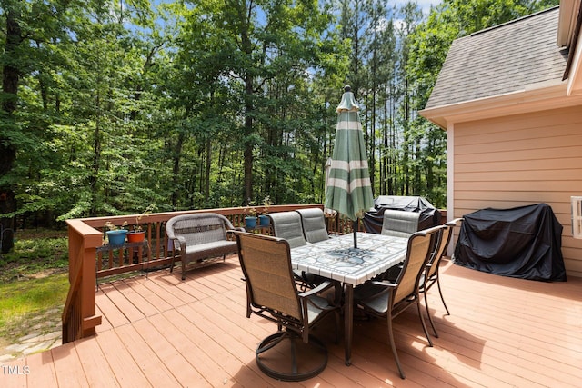 4306 Infinity Ln, Durham, NC 27705 - wooden terrace with outdoor dining space and a grill