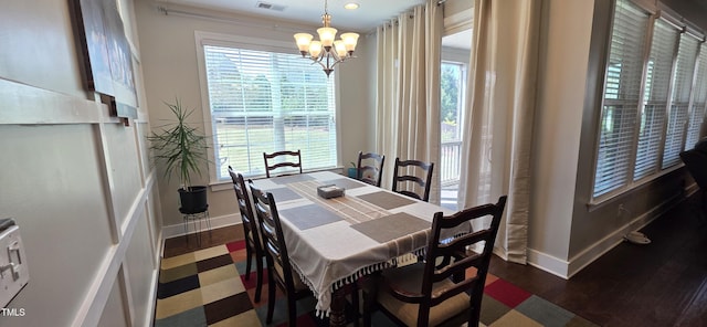 dining room with baseboards, a chandelier, plenty of natural light, and recessed lighting