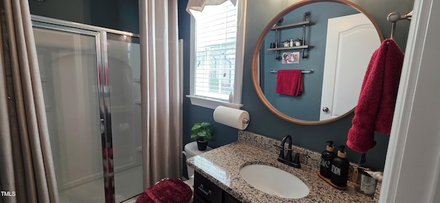 full bath featuring a shower stall and vanity