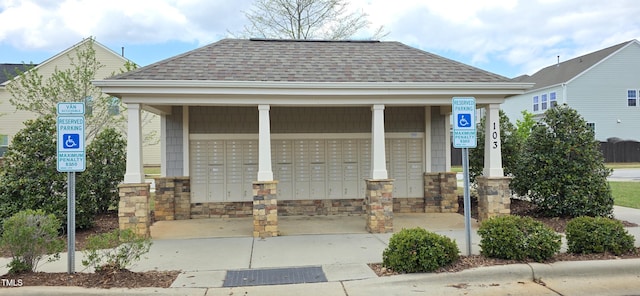 view of property's community featuring mail area
