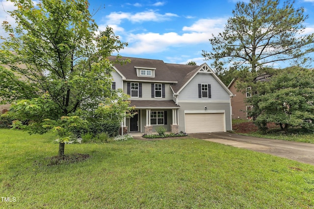 5025 Stonewood Pines Dr, Knightdale, NC 27545 - view of front of house featuring a garage, concrete driveway, a front lawn, covered porch, and roof with shingles