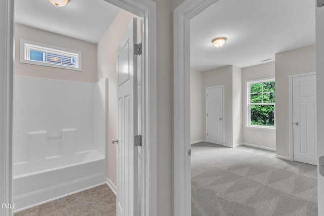 5025 Stonewood Pines Dr, Knightdale, NC 27545 - bathroom featuring baseboards and washtub / shower combination