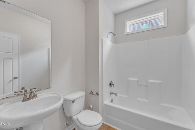5025 Stonewood Pines Dr, Knightdale, NC 27545 - bathroom with a sink, toilet, washtub / shower combination, and baseboards