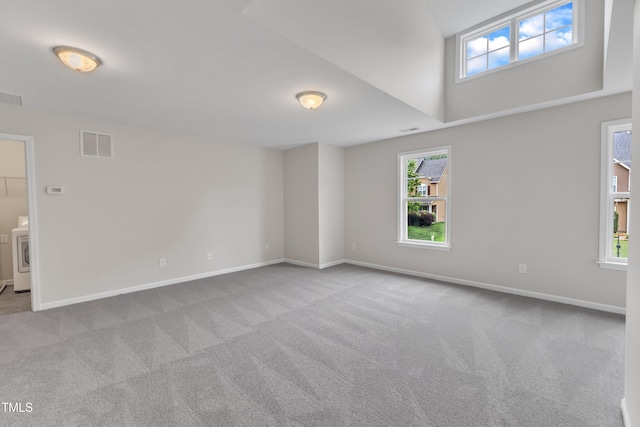 5025 Stonewood Pines Dr, Knightdale, NC 27545 - empty room featuring washer / dryer, carpet, and baseboards