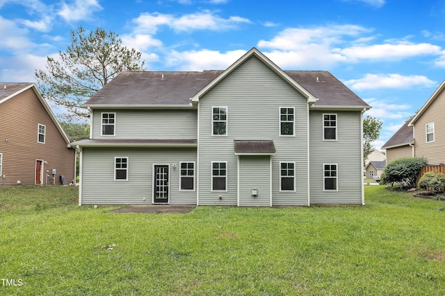 5025 Stonewood Pines Dr, Knightdale, NC 27545 - back of property featuring a yard and a patio area