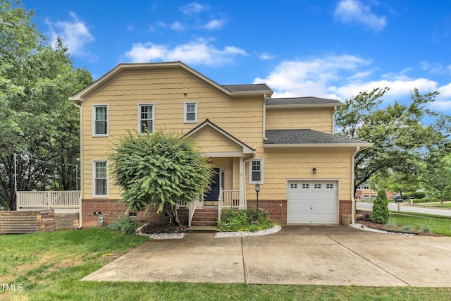 view of front of home with driveway, an attached garage, a front lawn, brick siding, and roof with shingles