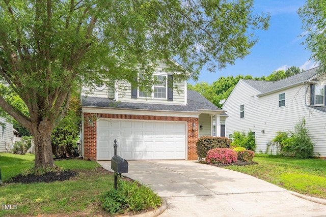 traditional home featuring brick siding, a garage, concrete driveway, and a front yard