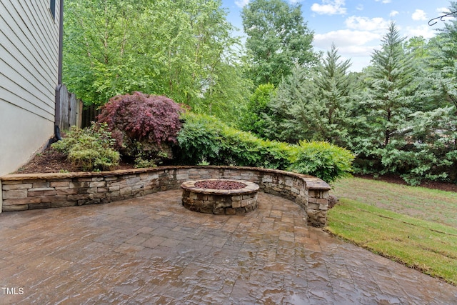 view of patio / terrace featuring a fire pit