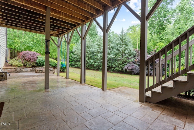 view of patio / terrace featuring stairs