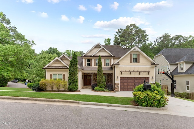craftsman inspired home featuring driveway, stone siding, central air condition unit, and an attached garage