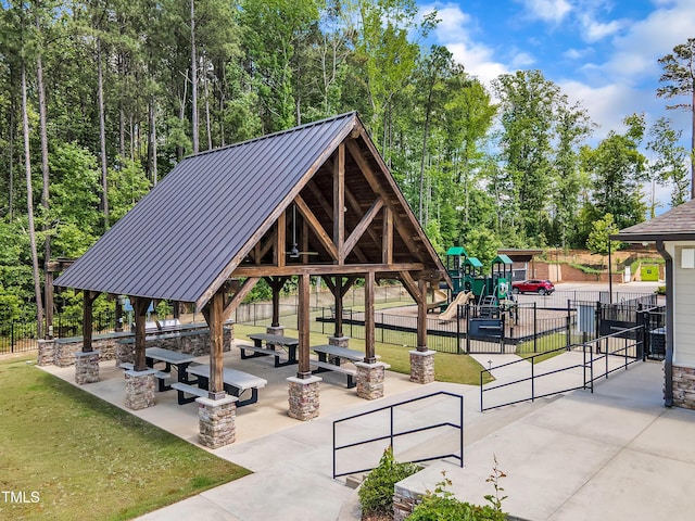 view of property's community with a gazebo and a patio area