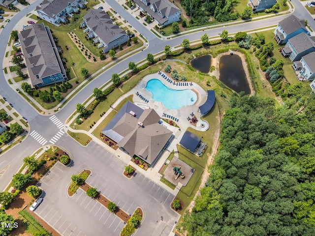 aerial perspective of suburban area with a pool area