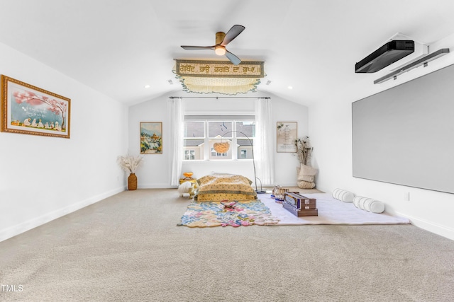 living area featuring vaulted ceiling, carpet floors, ceiling fan, and baseboards