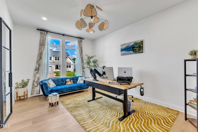 home office featuring wood finished floors, baseboards, and recessed lighting