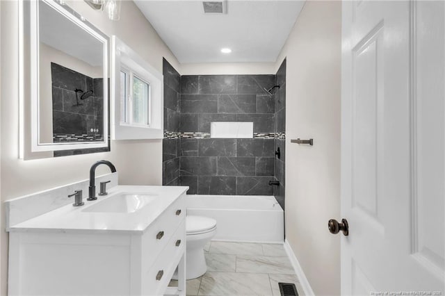 bathroom with bathtub / shower combination, marble finish floors, vanity, toilet, and baseboards