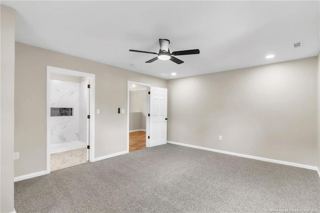 unfurnished bedroom featuring carpet flooring, baseboards, ensuite bathroom, a ceiling fan, and recessed lighting