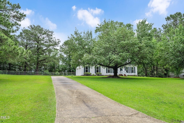 124 Windmere Dr, Angier, NC 27501 - view of front of home with asphalt driveway