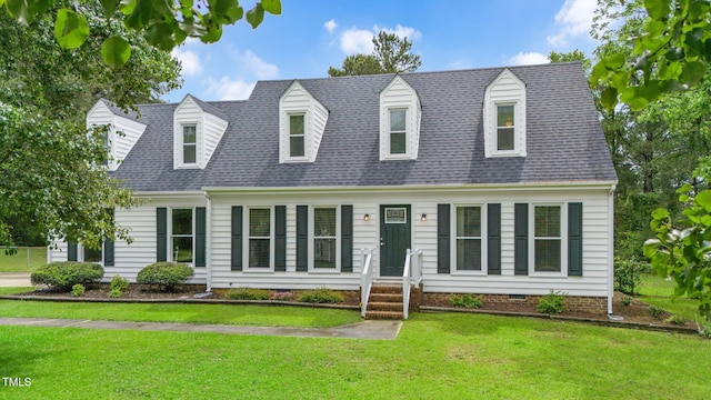 124 Windmere Dr, Angier, NC 27501 - cape cod house with a front yard and roof with shingles