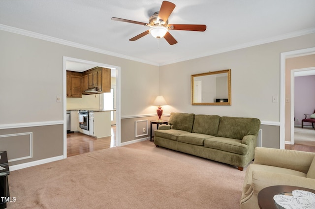 124 Windmere Dr, Angier, NC 27501 - living area featuring light colored carpet, ornamental molding, and a ceiling fan