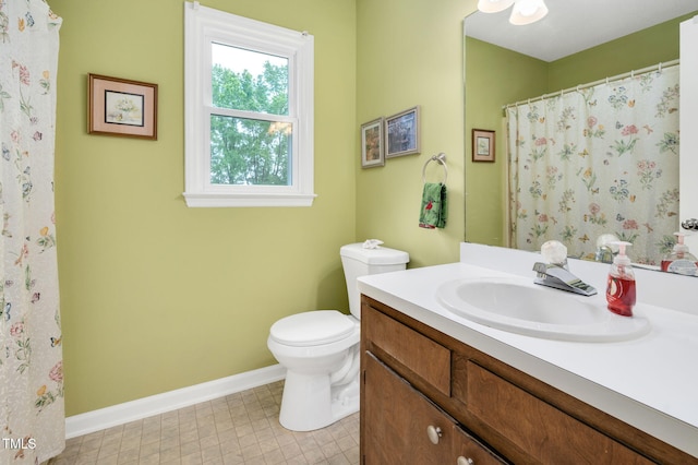 124 Windmere Dr, Angier, NC 27501 - bathroom with baseboards, toilet, vanity, and curtained shower