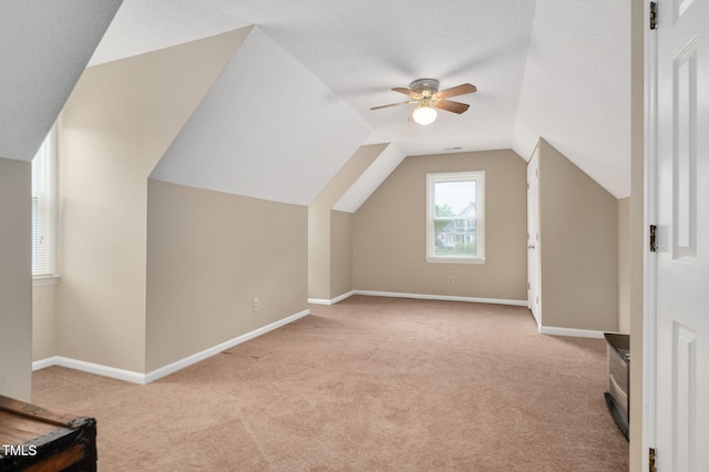 124 Windmere Dr, Angier, NC 27501 - bonus room featuring carpet, a ceiling fan, baseboards, and lofted ceiling