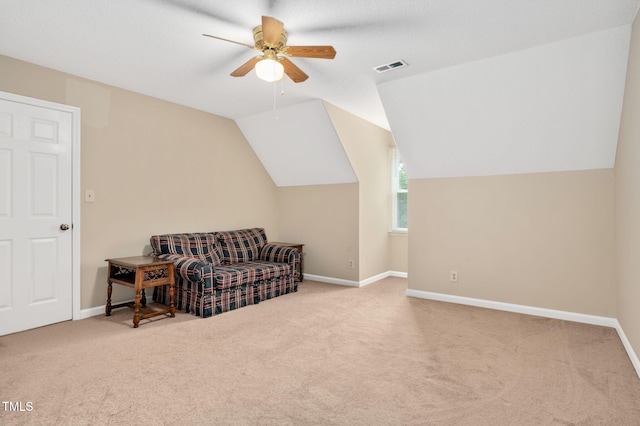 124 Windmere Dr, Angier, NC 27501 - living area featuring a ceiling fan, carpet, baseboards, and lofted ceiling