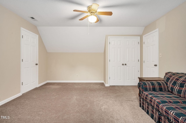 124 Windmere Dr, Angier, NC 27501 - sitting room featuring carpet, ceiling fan, lofted ceiling, and baseboards