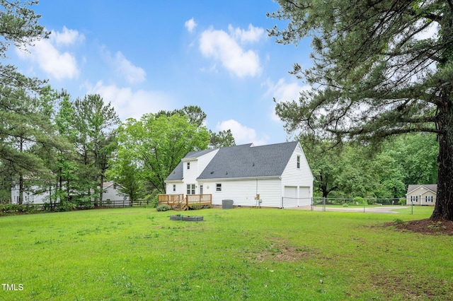 124 Windmere Dr, Angier, NC 27501 - view of yard with a deck and an attached garage