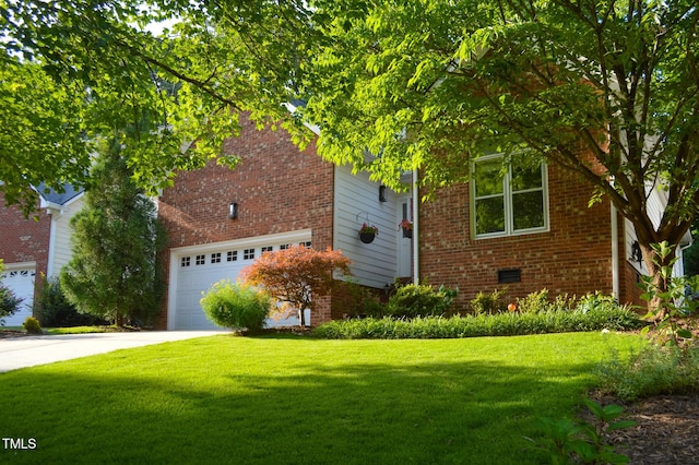 123 Chimney Rise Dr, Cary, NC 27511 - view of front facade featuring a front lawn, driveway, and brick siding