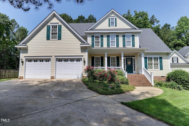 119 Marykirk Pl, Garner, NC 27529 - traditional-style house with covered porch, concrete driveway, crawl space, roof with shingles, and an attached garage
