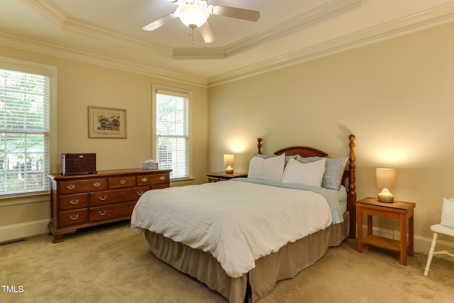 119 Marykirk Pl, Garner, NC 27529 - bedroom featuring multiple windows, light colored carpet, a raised ceiling, and ornamental molding