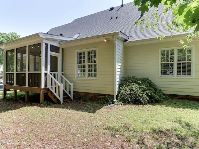 119 Marykirk Pl, Garner, NC 27529 - rear view of house featuring crawl space, a sunroom, roof with shingles, and a lawn