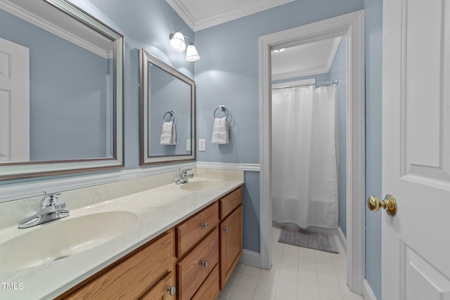 bathroom with crown molding, double vanity, tile patterned flooring, baseboards, and curtained shower