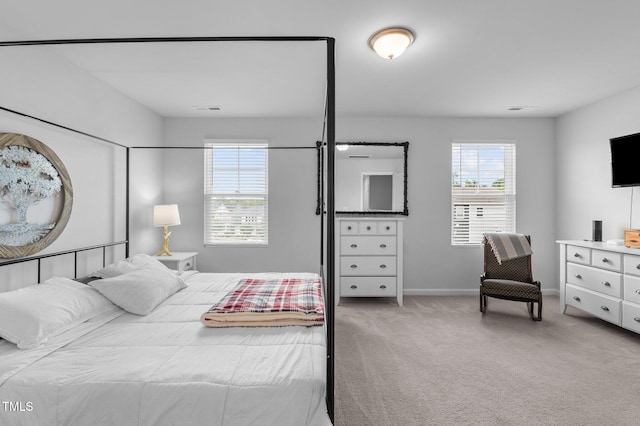 6352 Perry Creek Rd, Raleigh, NC 27616 - carpeted bedroom featuring baseboards
