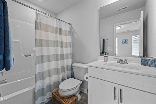 6352 Perry Creek Rd, Raleigh, NC 27616 - full bathroom with toilet, vanity, and shower / tub combo