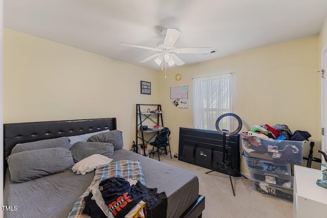 bedroom featuring carpet flooring and a ceiling fan