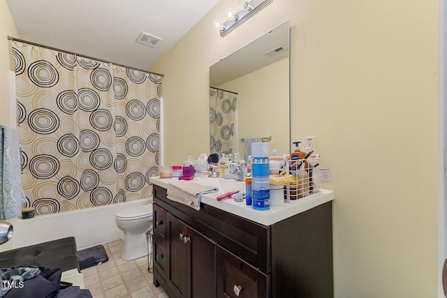 full bathroom with vanity, shower / bath combination with curtain, tile patterned floors, and toilet