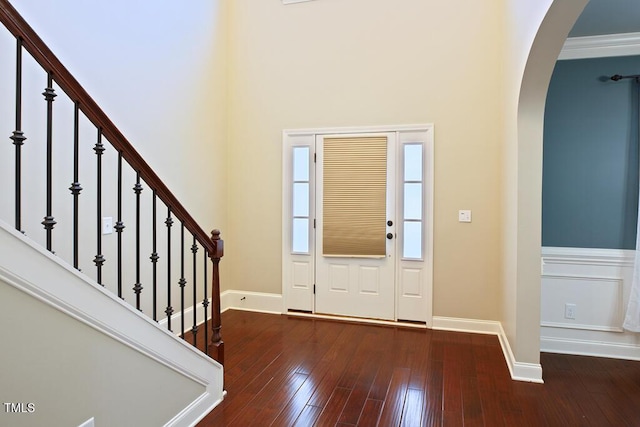 337 Shadowdale Ln, Rolesville, NC 27571 - entrance foyer with arched walkways, baseboards, hardwood / wood-style flooring, and stairs