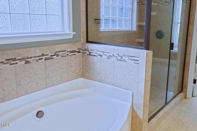 337 Shadowdale Ln, Rolesville, NC 27571 - bathroom featuring plenty of natural light, a shower stall, and a garden tub