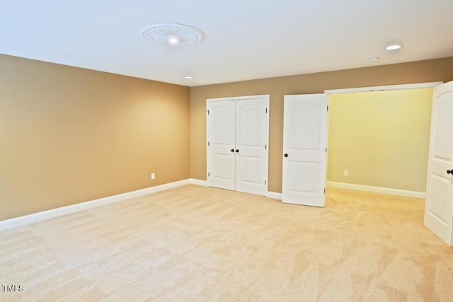 337 Shadowdale Ln, Rolesville, NC 27571 - unfurnished bedroom featuring light carpet, baseboards, and a closet